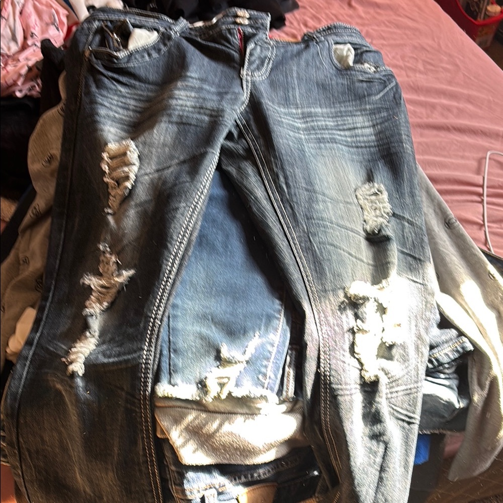 Skinny Blue Distressed Jeans with Rips and Whiskering